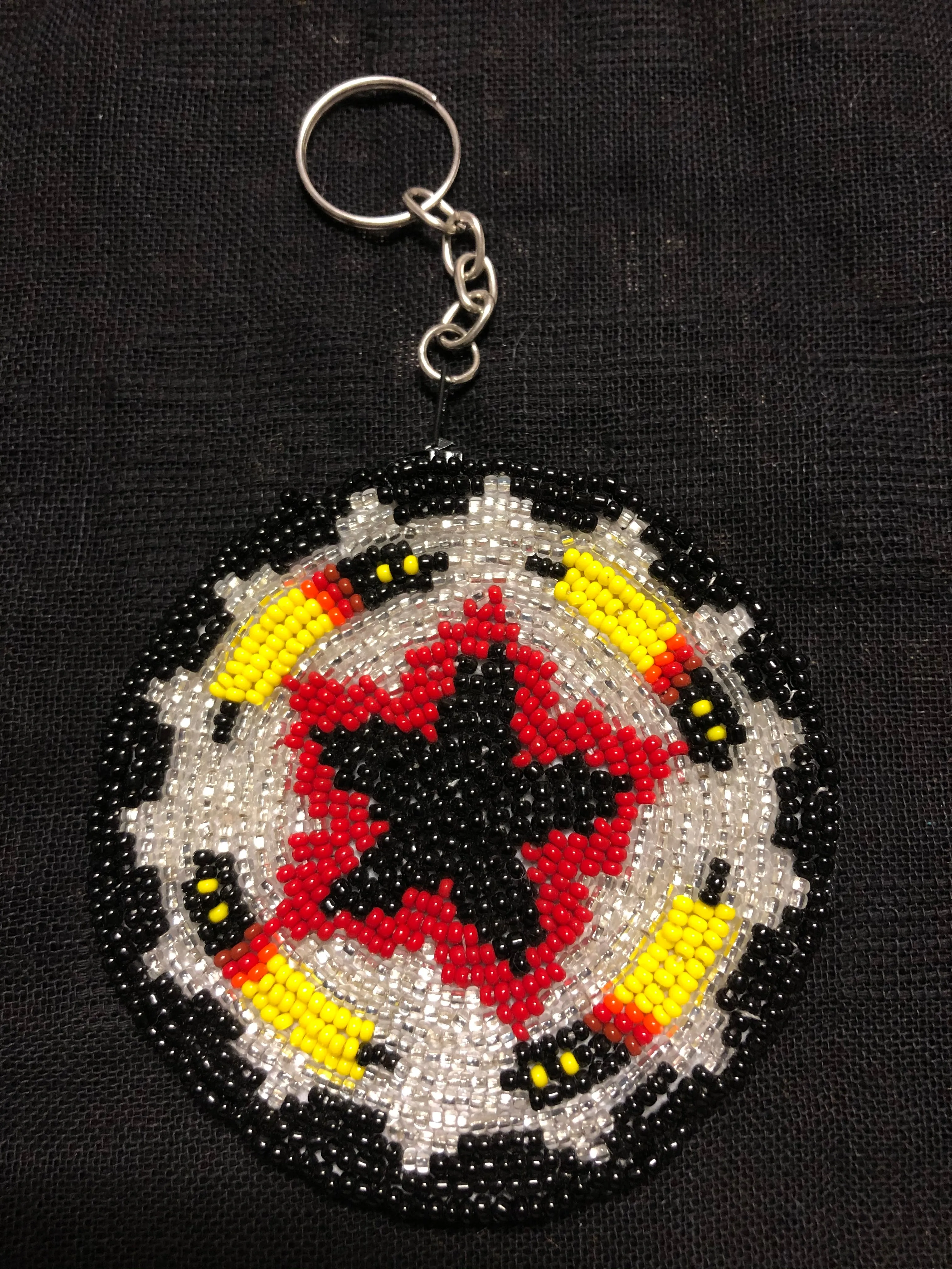 Guatemalan handcrafted glass bead round change purse with key ring. 3.5” diameter.